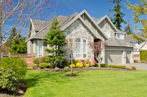 luxury home with a shingle roof for jng services toronto residential roof summer maintenance